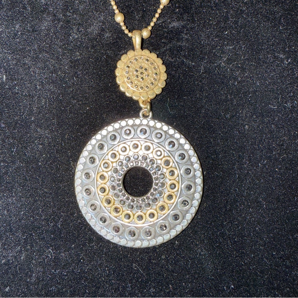 Elegant Gold and Silver Pendant Necklace